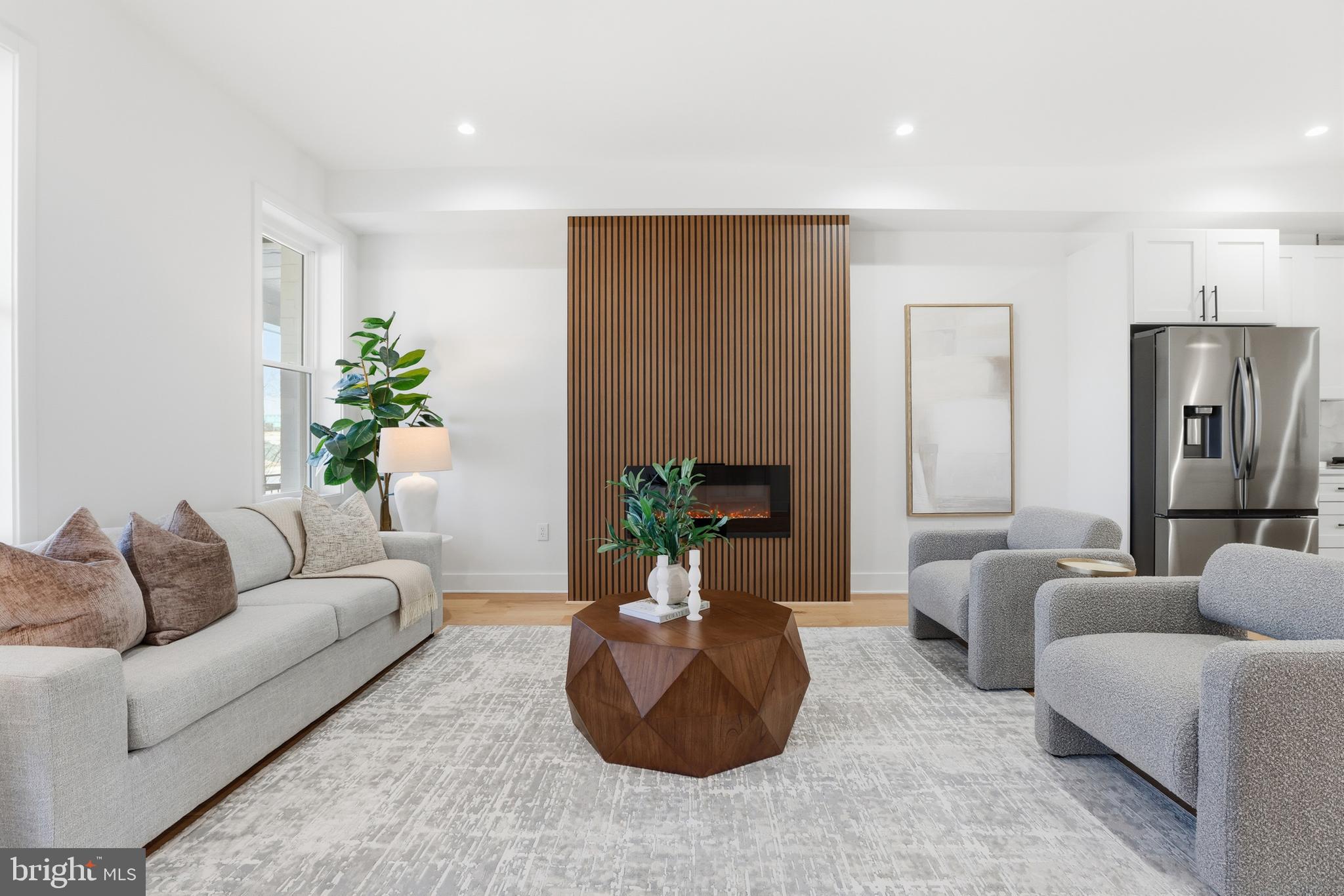 2815 North Capitol Street Northeast Washington, DC 20002 - Photo 4 of 87 a living room with furniture potted plant and a couch