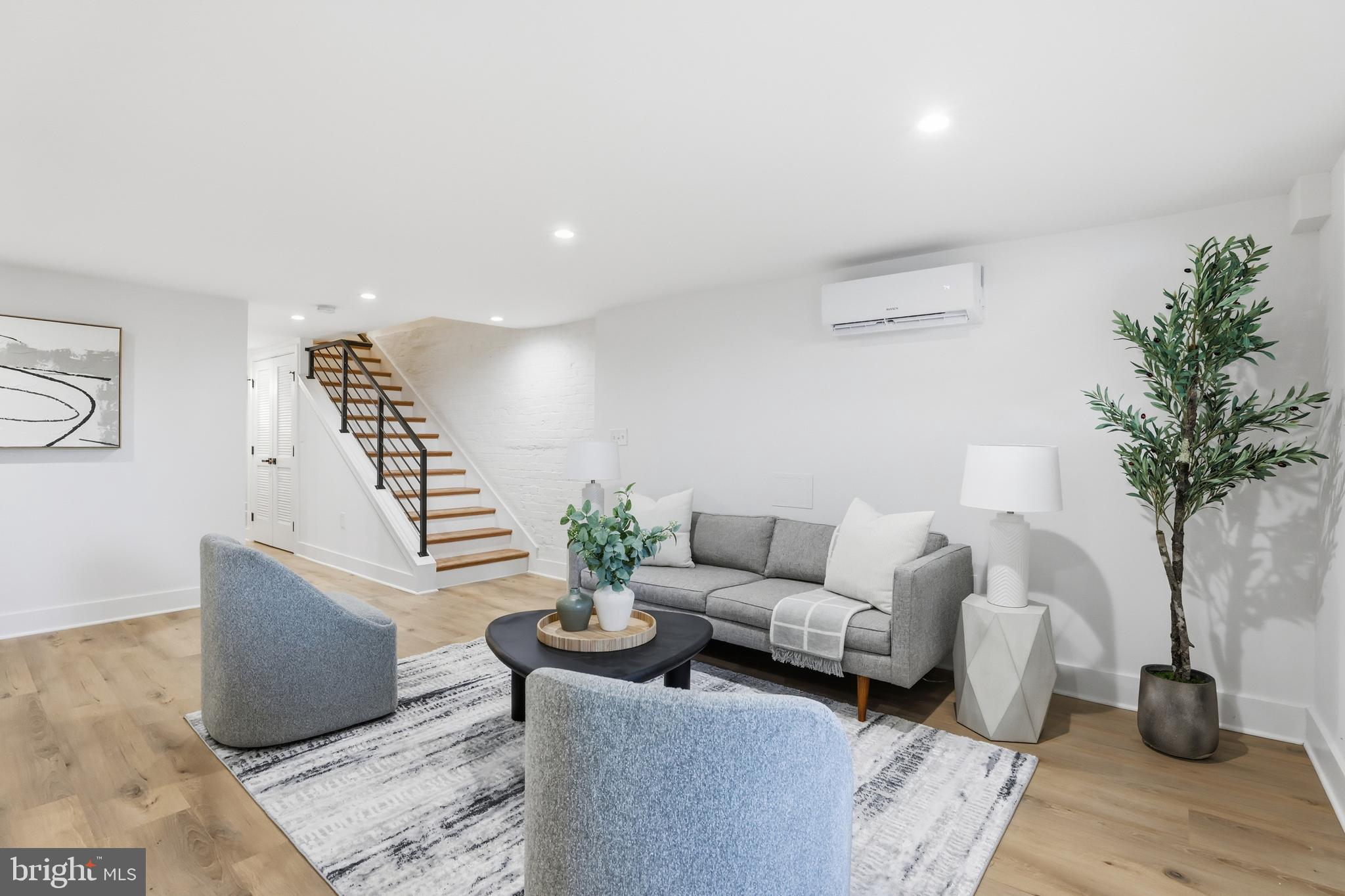 2815 North Capitol Street Northeast Washington, DC 20002 - Photo 42 of 87 a living room with furniture and wooden floor