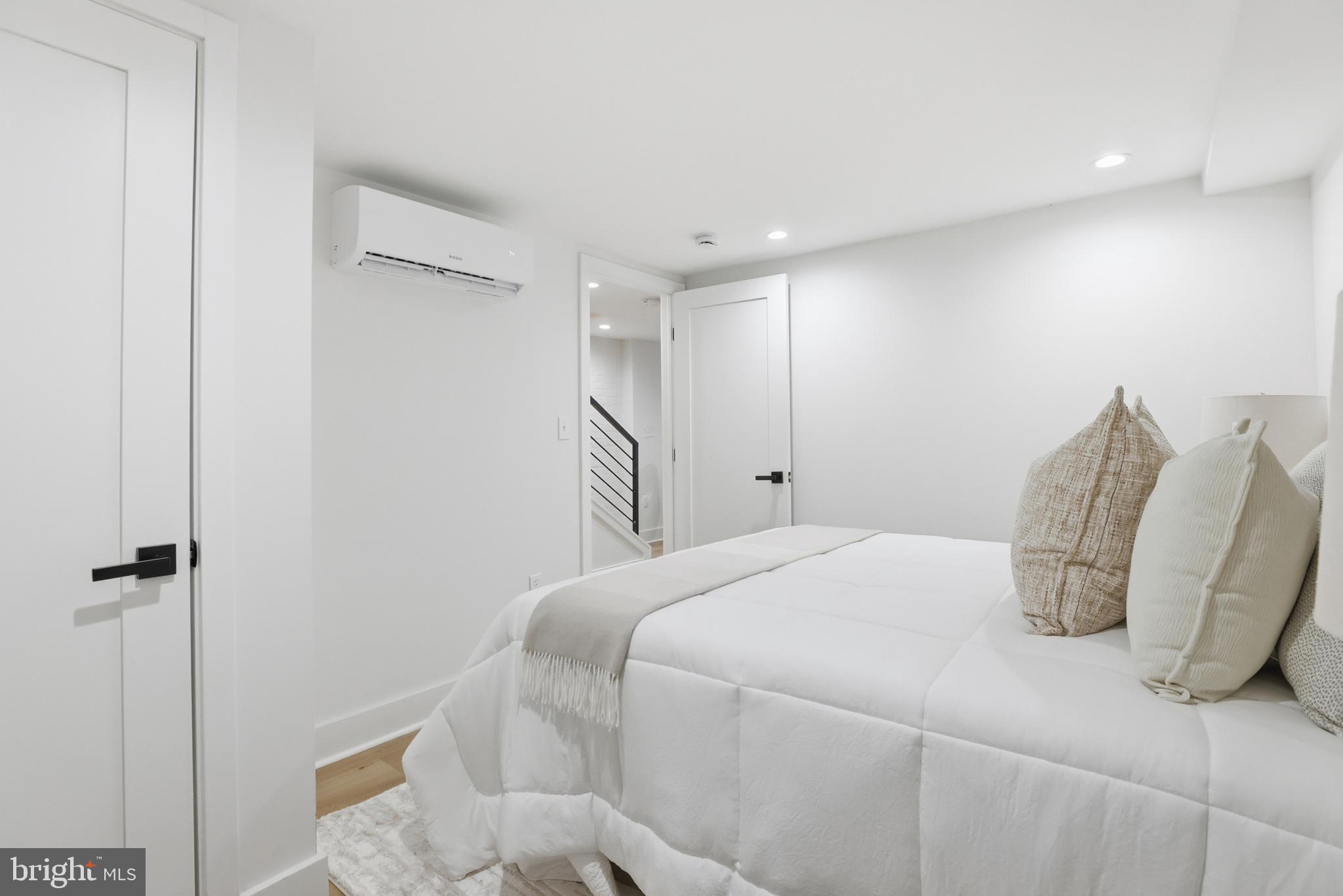 2815 North Capitol Street Northeast Washington, DC 20002 - Photo 48 of 87 a bedroom with a bed and a table