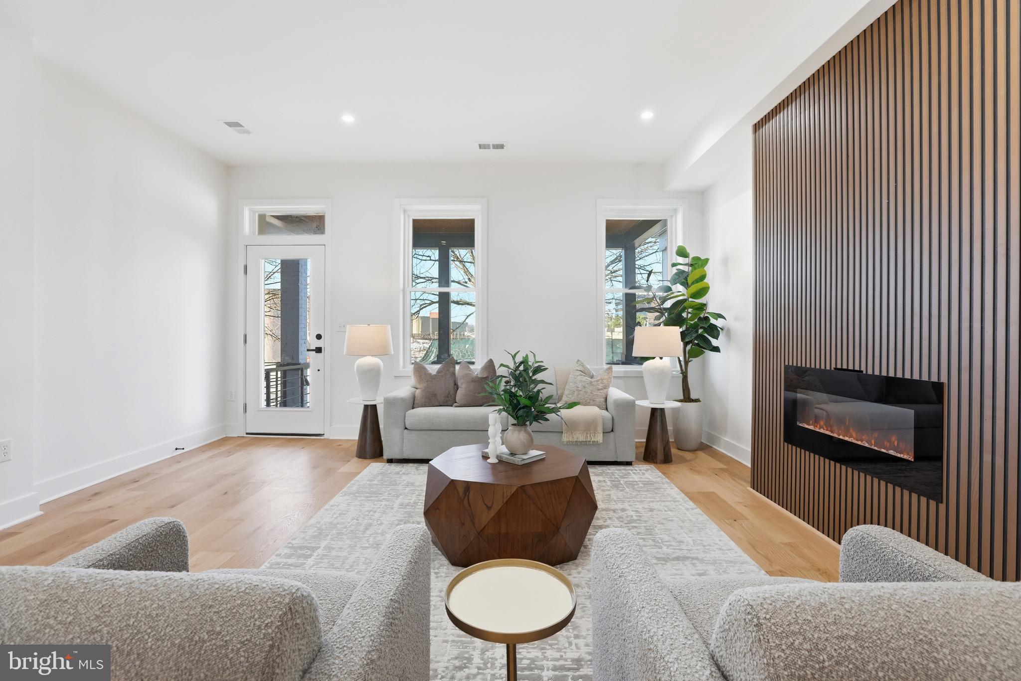 2815 North Capitol Street Northeast Washington, DC 20002 - Photo 7 of 87 a living room with furniture and a fireplace