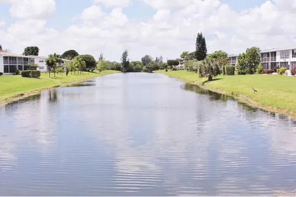 a view of a lake with a big yard