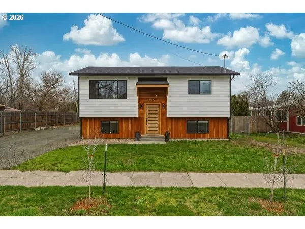 a view front of house with a yard