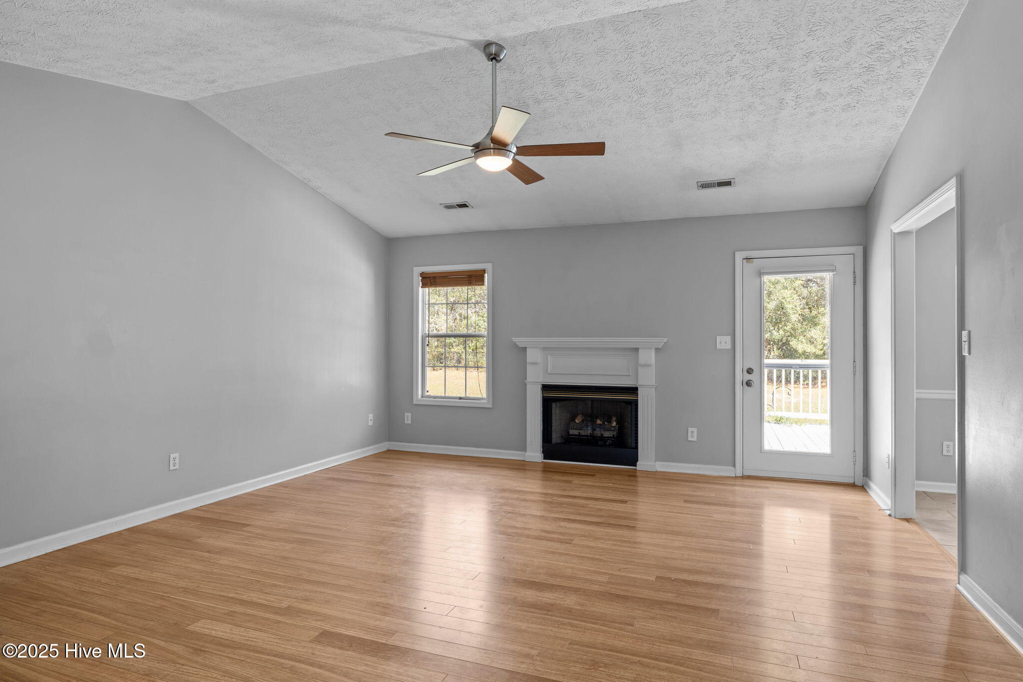 115 Countryside Court Newport, NC 28570 - Photo 9 of 52 Another view of the Living Area with Fireplace
