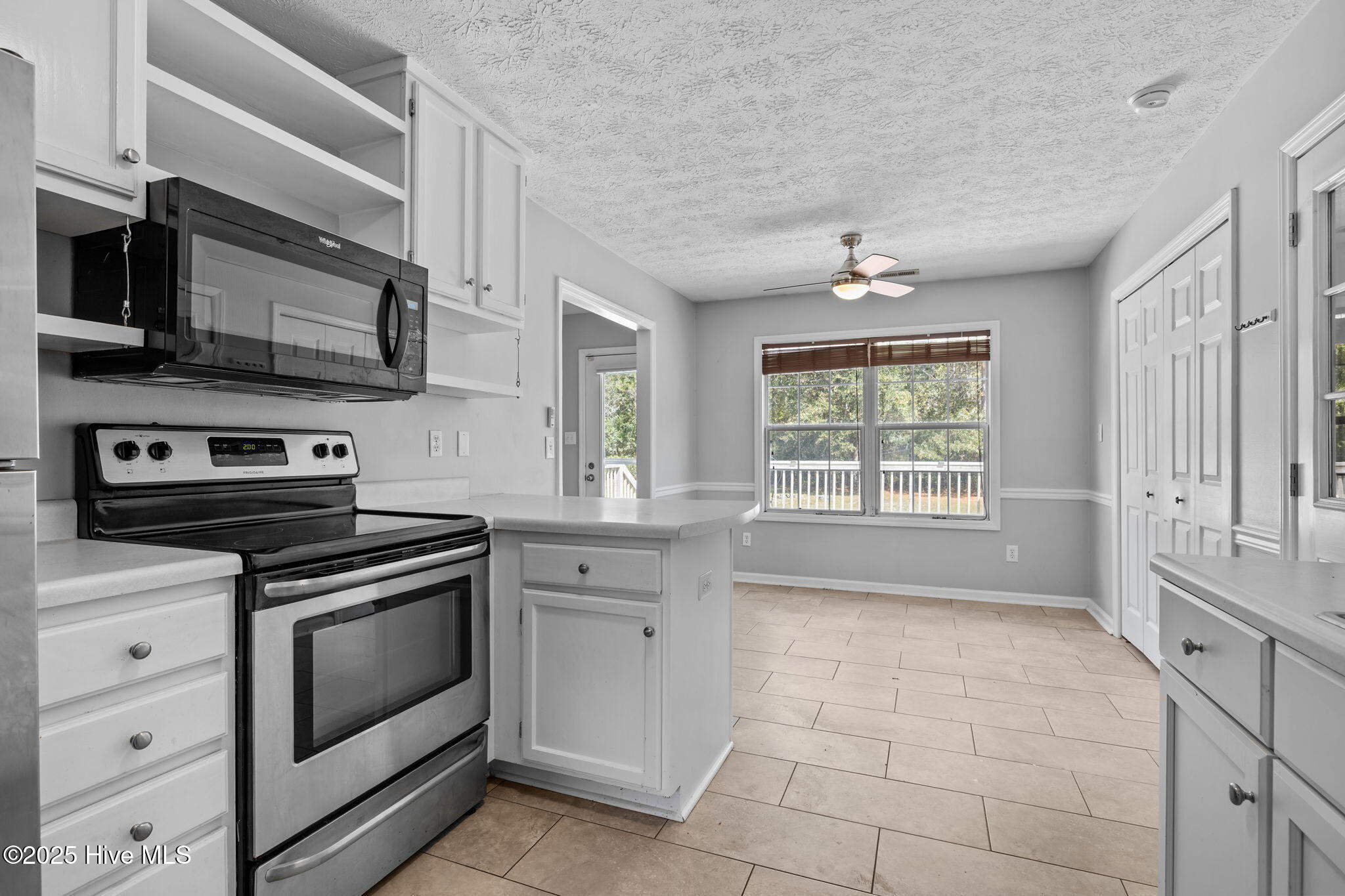 115 Countryside Court Newport, NC 28570 - Photo 11 of 52 Kitchen with view of eat-in dining area
