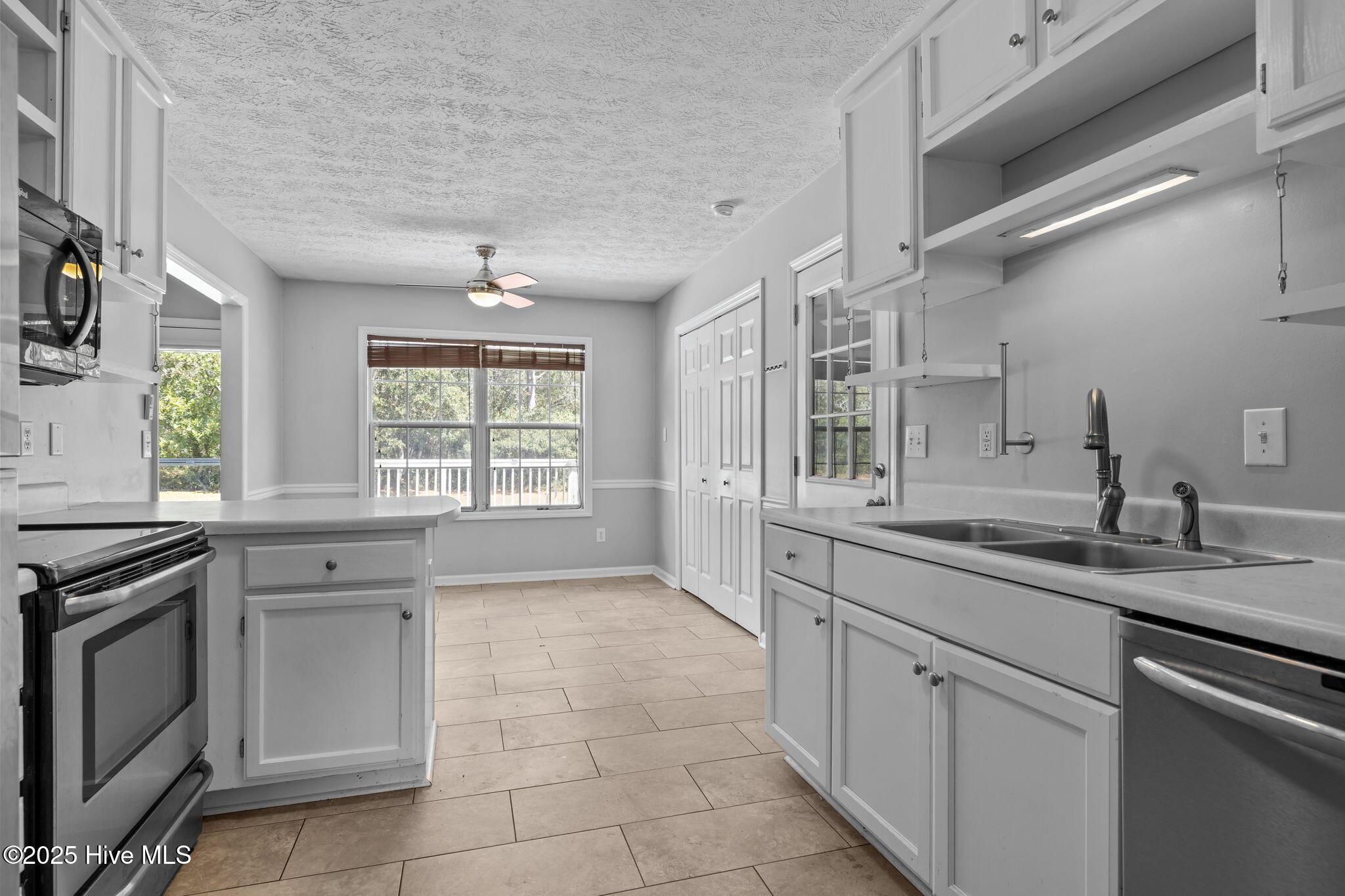 115 Countryside Court Newport, NC 28570 - Photo 12 of 52 Another view of Kitchen with view of eat-in dining area