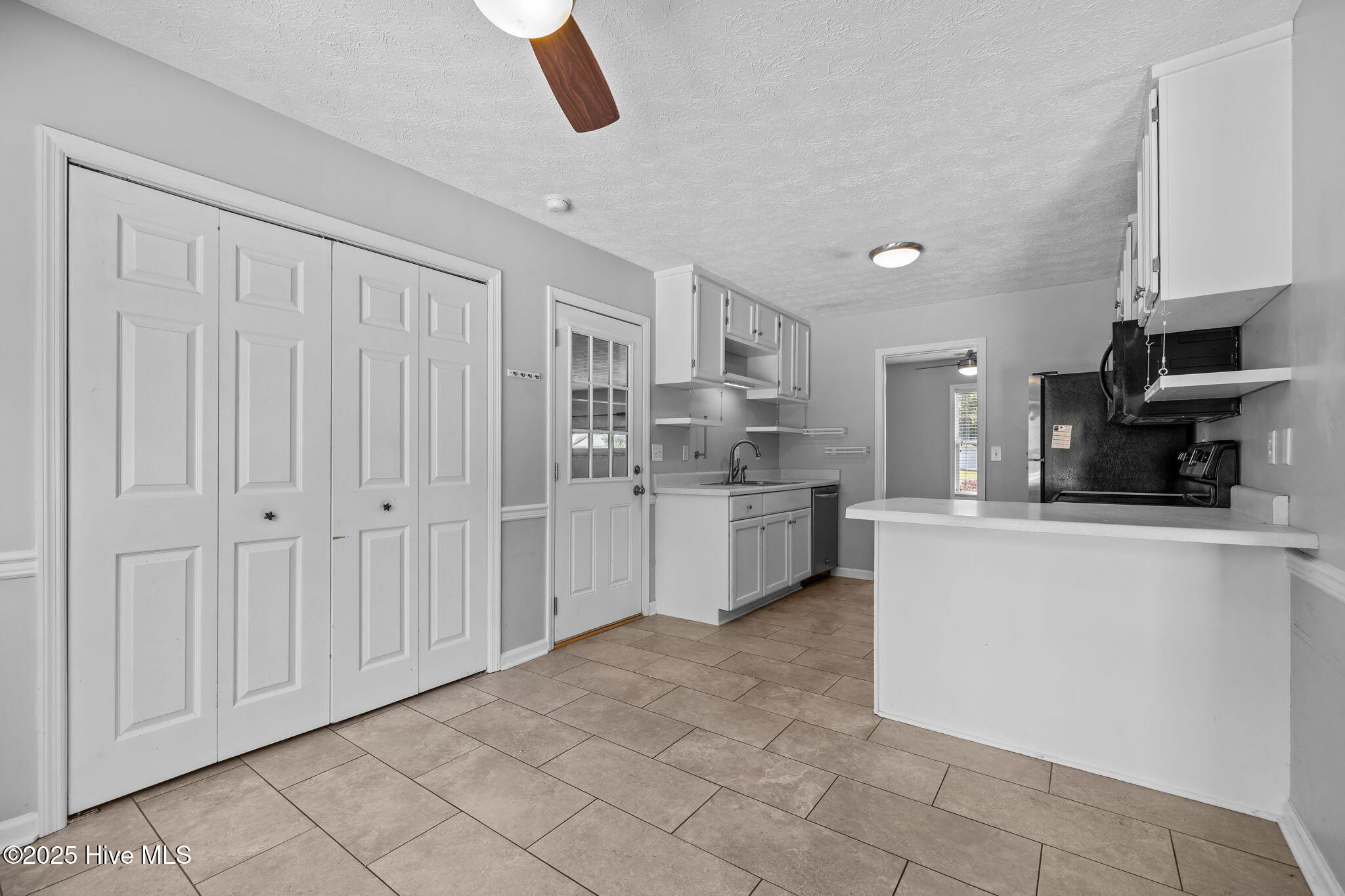 115 Countryside Court Newport, NC 28570 - Photo 15 of 52 The double doors are where the washer and dryer are located