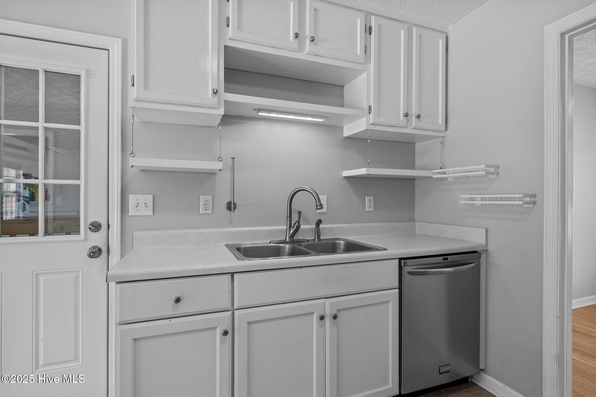 115 Countryside Court Newport, NC 28570 - Photo 16 of 52 Kitchen view with the door leading to the garage