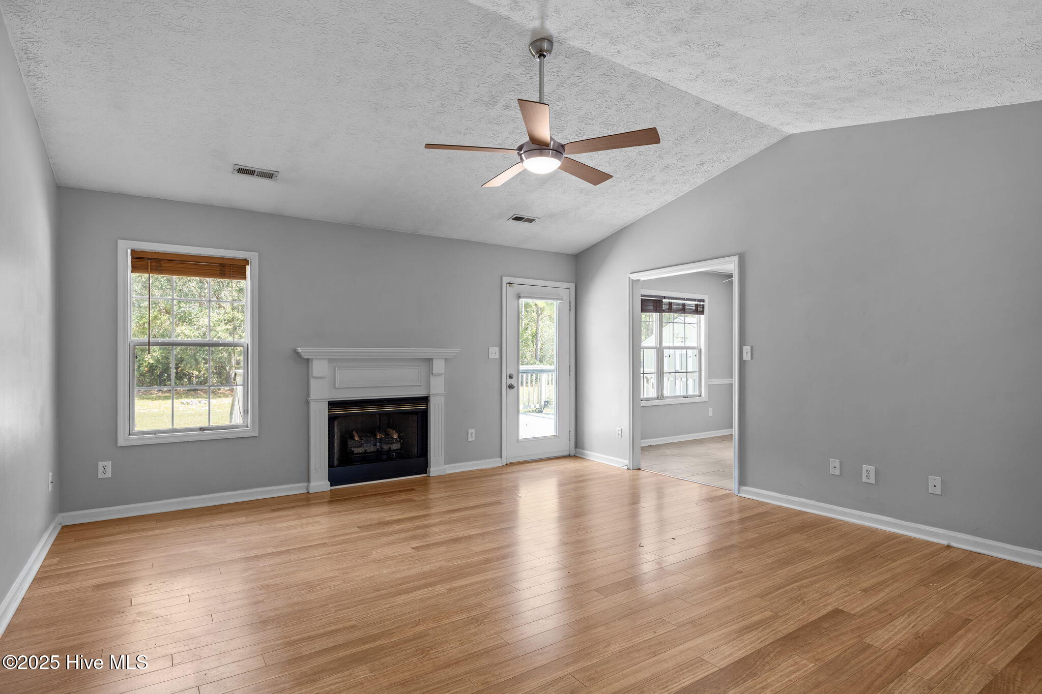 115 Countryside Court Newport, NC 28570 - Photo 8 of 52 Living Area with Fireplace