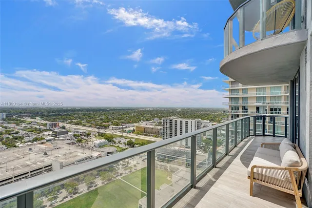 a view of a balcony with city view