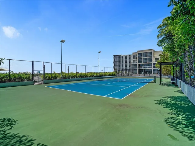 a view of a balcony with furniture
