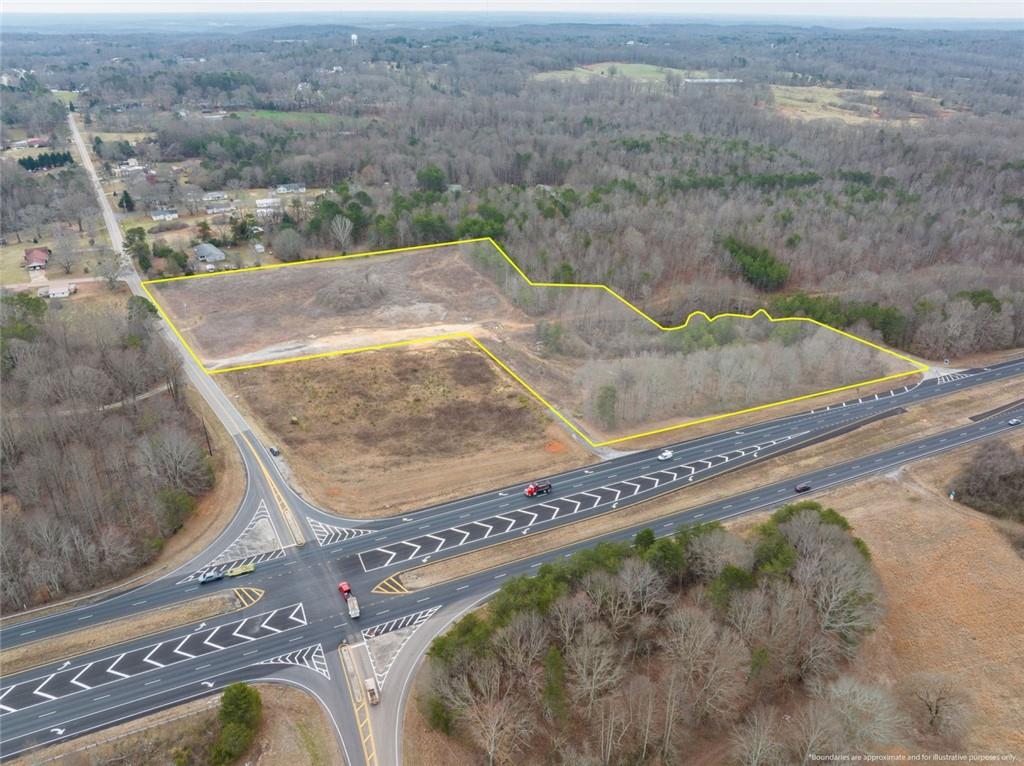 4920 Cornelia Highway Lula, GA 30554 - Photo 15 of 44 a view of a swimming pool with a yard