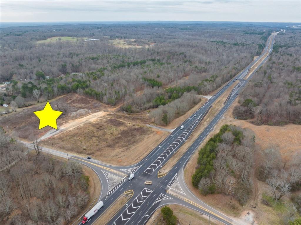 4920 Cornelia Highway Lula, GA 30554 - Photo 24 of 44 a view of a back yard of a house