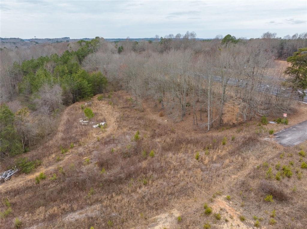 4920 Cornelia Highway Lula, GA 30554 - Photo 42 of 44 a view of a dry field with trees in the background
