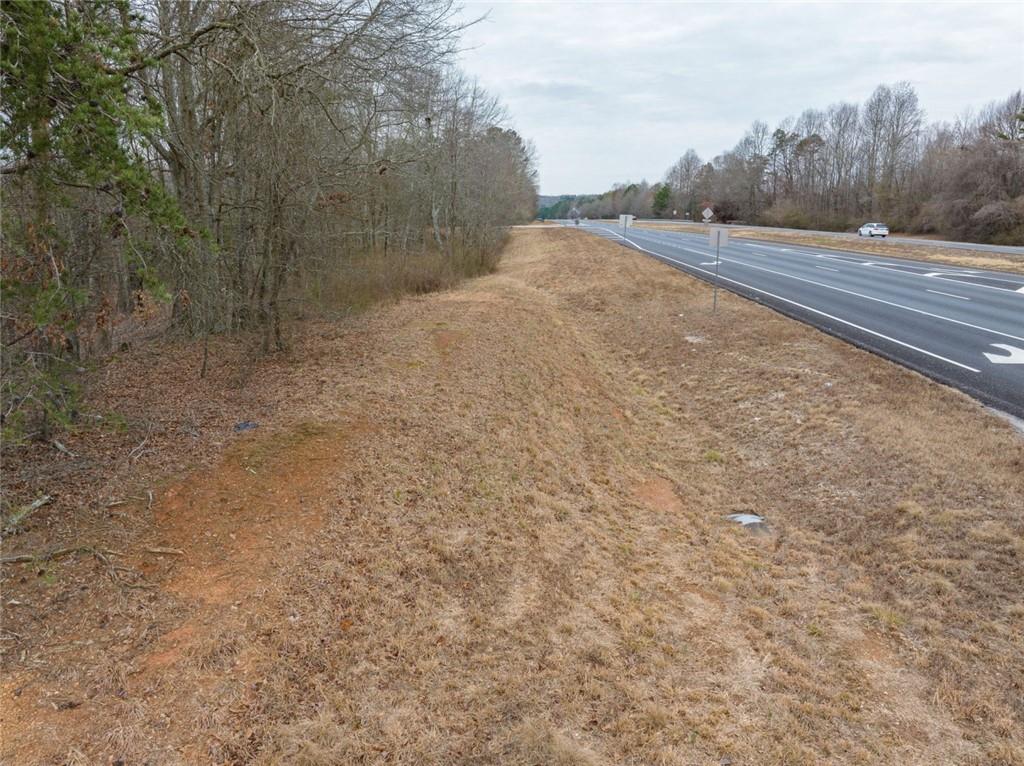 4920 Cornelia Highway Lula, GA 30554 - Photo 43 of 44 a view of a dry yard with trees