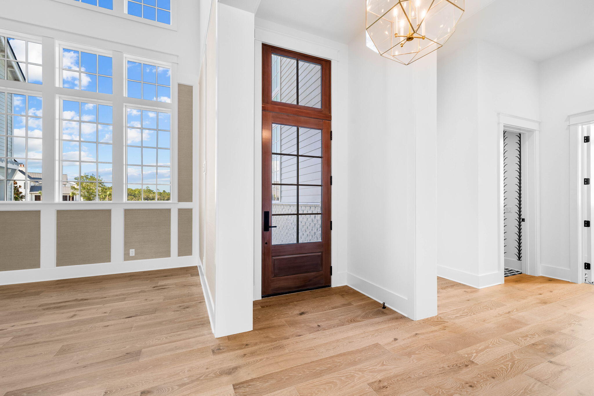 295 Golf Ridge Dr Inlet Beach Inlet Beach, FL 32461 - Photo 11 of 94 a view of an empty room with a window and wooden floor