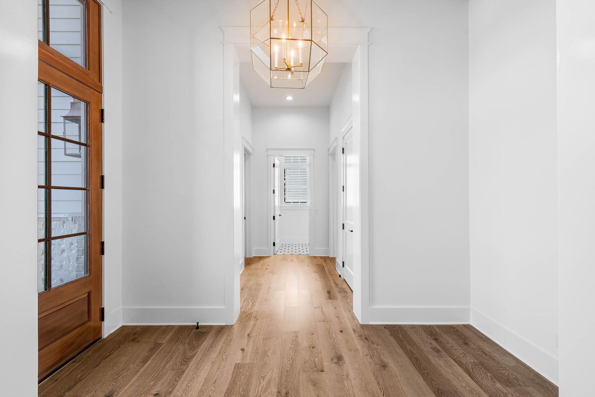 295 Golf Ridge Dr Inlet Beach Inlet Beach, FL 32461 - Photo 12 of 94 a view of a hallway with wooden floor and a window