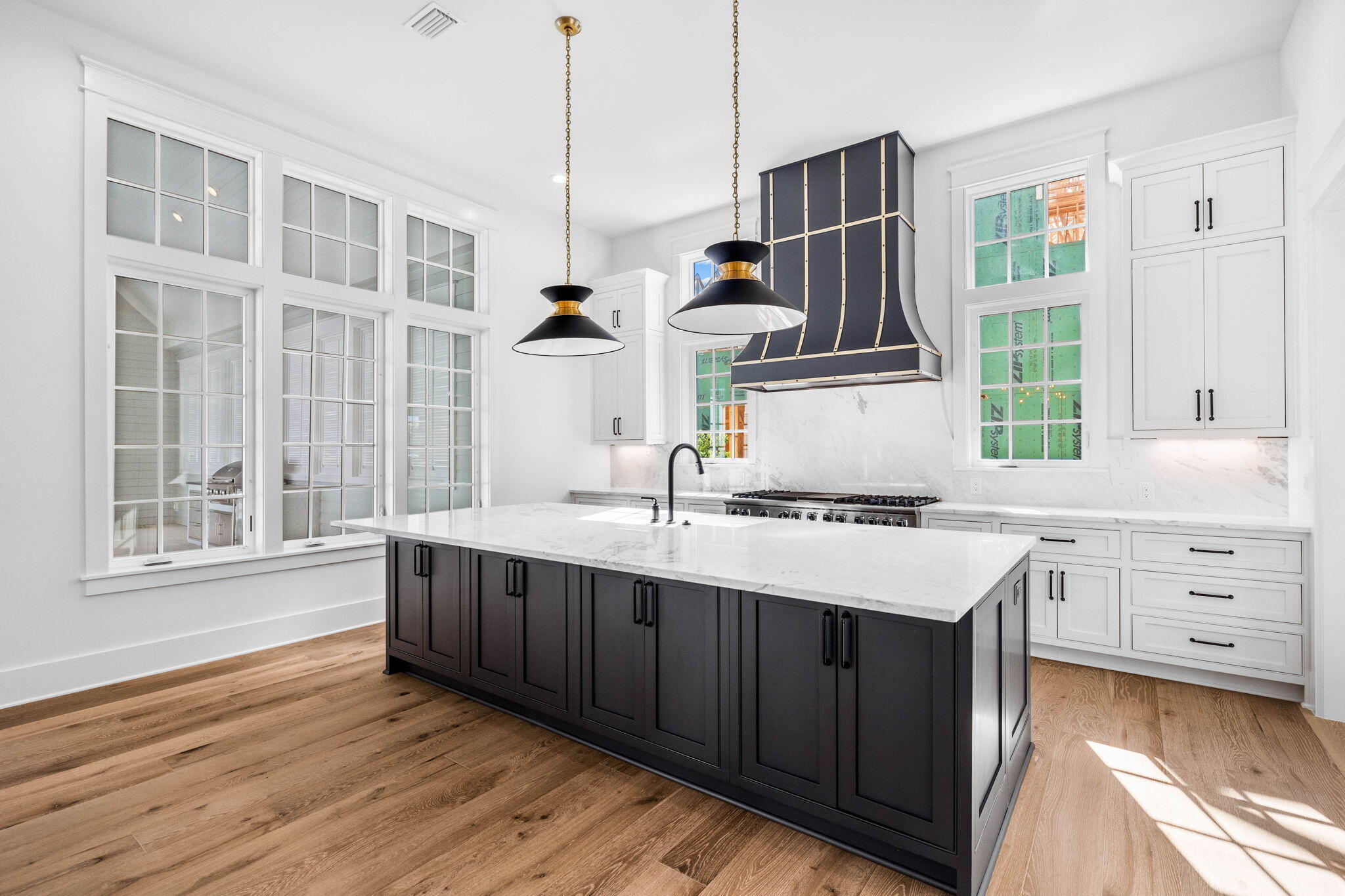 295 Golf Ridge Dr Inlet Beach Inlet Beach, FL 32461 - Photo 28 of 94 a kitchen with a sink and wooden floor