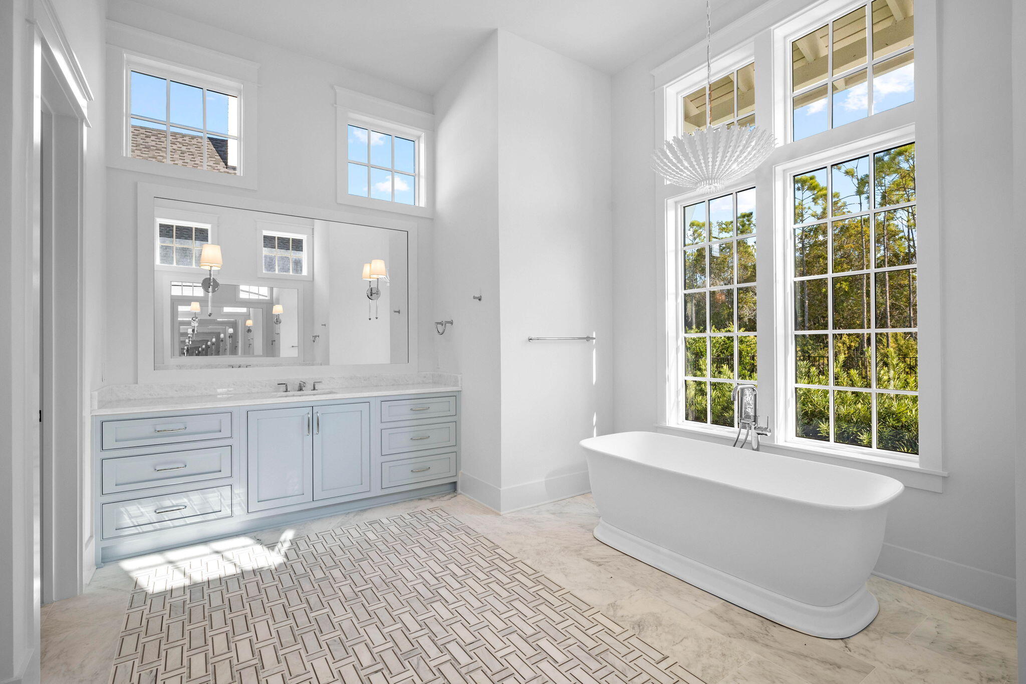 295 Golf Ridge Dr Inlet Beach Inlet Beach, FL 32461 - Photo 53 of 94 a bathroom with a bathtub a sink and a large window
