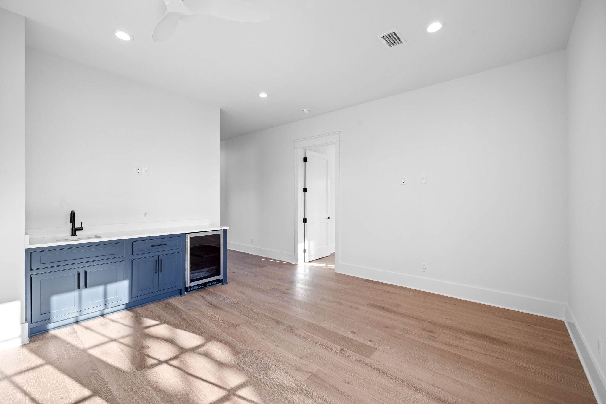 295 Golf Ridge Dr Inlet Beach Inlet Beach, FL 32461 - Photo 68 of 94 an empty room with wooden floor and cabinet