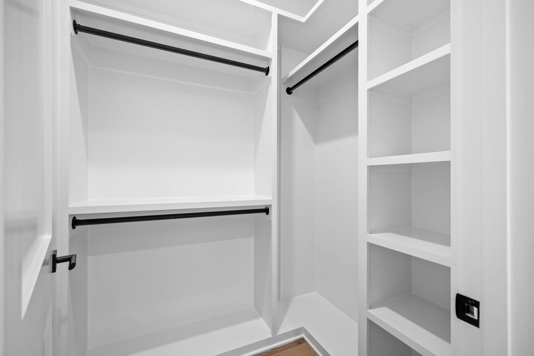 295 Golf Ridge Dr Inlet Beach Inlet Beach, FL 32461 - Photo 72 of 94 a view of walk in closet with empty racks