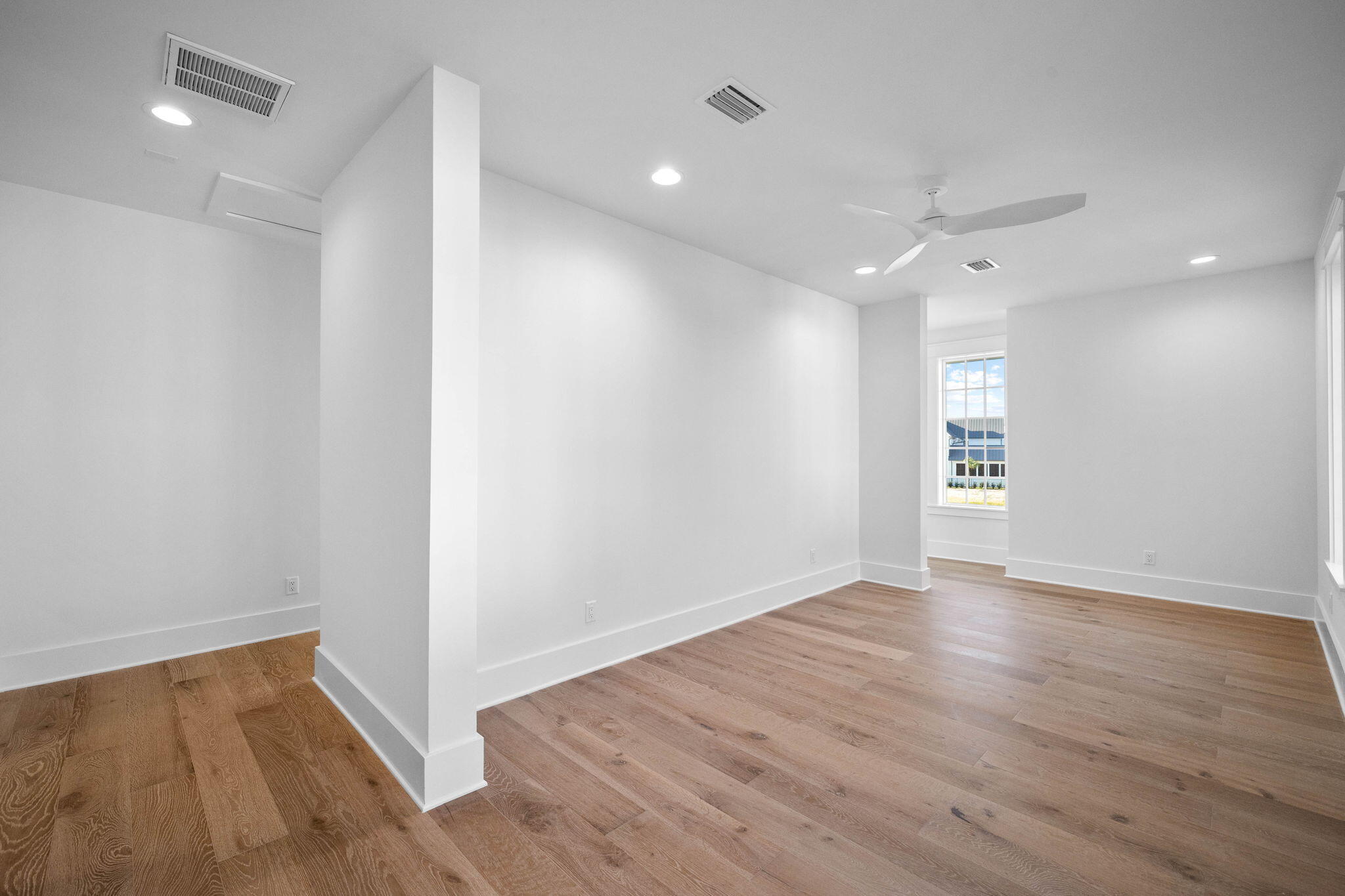295 Golf Ridge Dr Inlet Beach Inlet Beach, FL 32461 - Photo 74 of 94 a view of an empty room with wooden floor