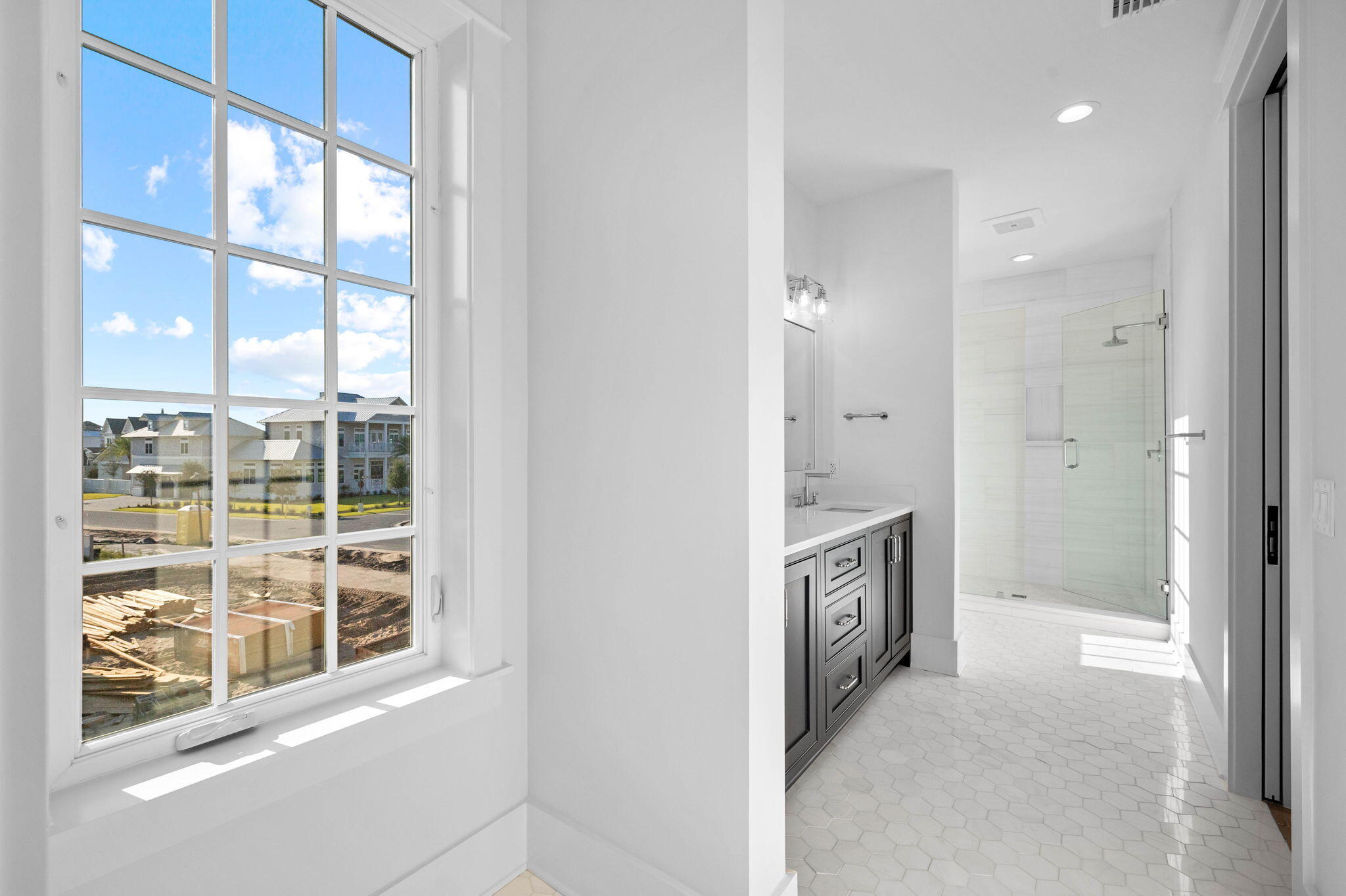 295 Golf Ridge Dr Inlet Beach Inlet Beach, FL 32461 - Photo 78 of 94 a spacious bathroom with a double vanity sink and a window