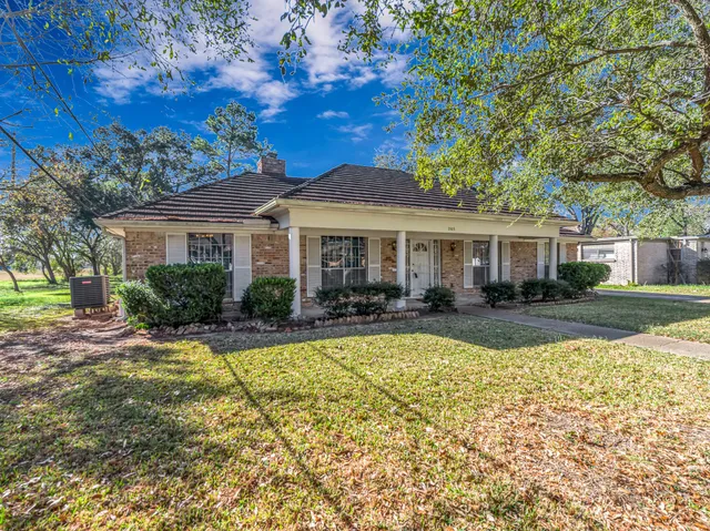 a view of a house with swimming pool