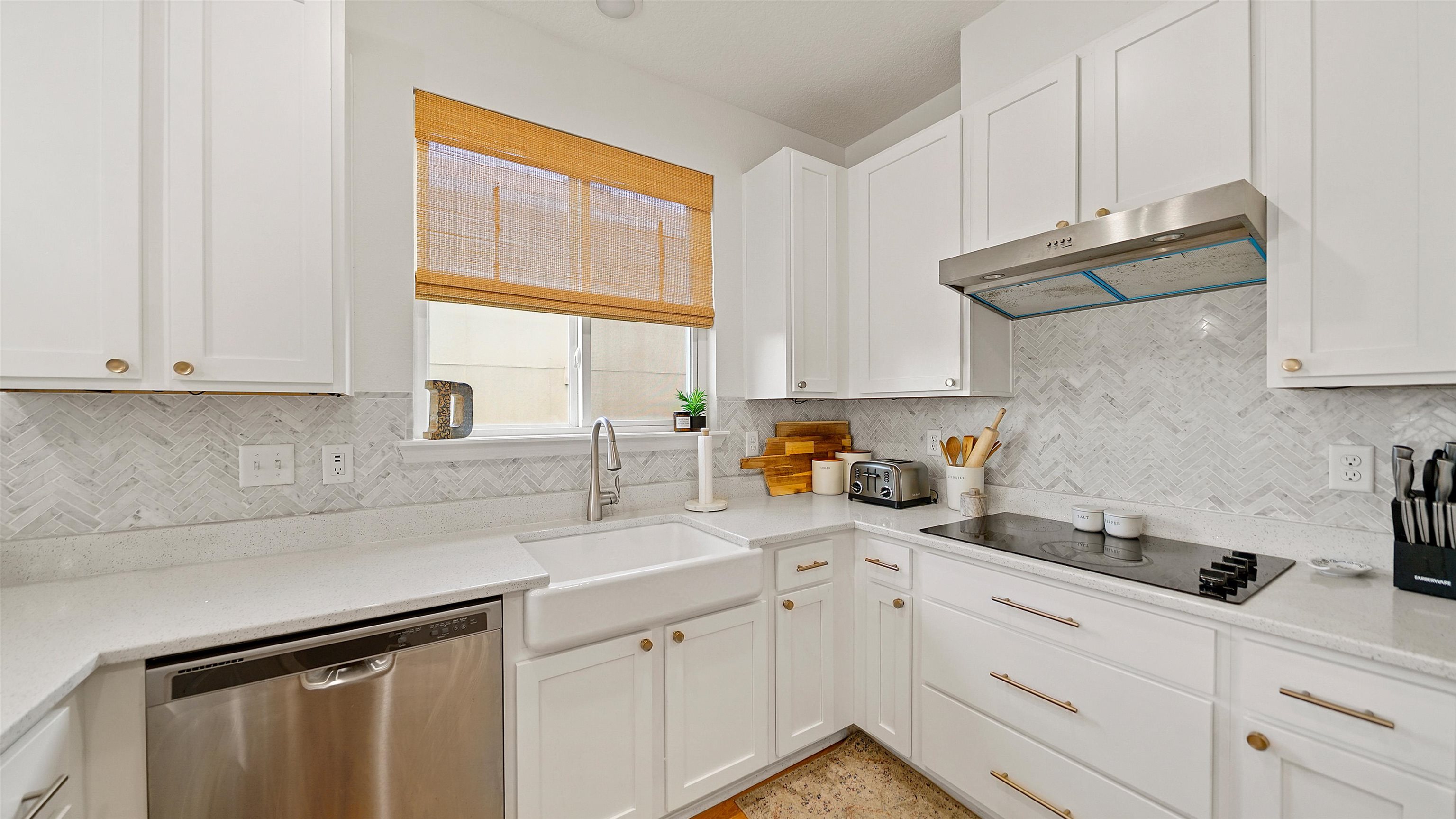 9658 Freefall Road Jacksonville, FL 32221 - Photo 14 of 39 a kitchen with stainless steel appliances white cabinets and a window
