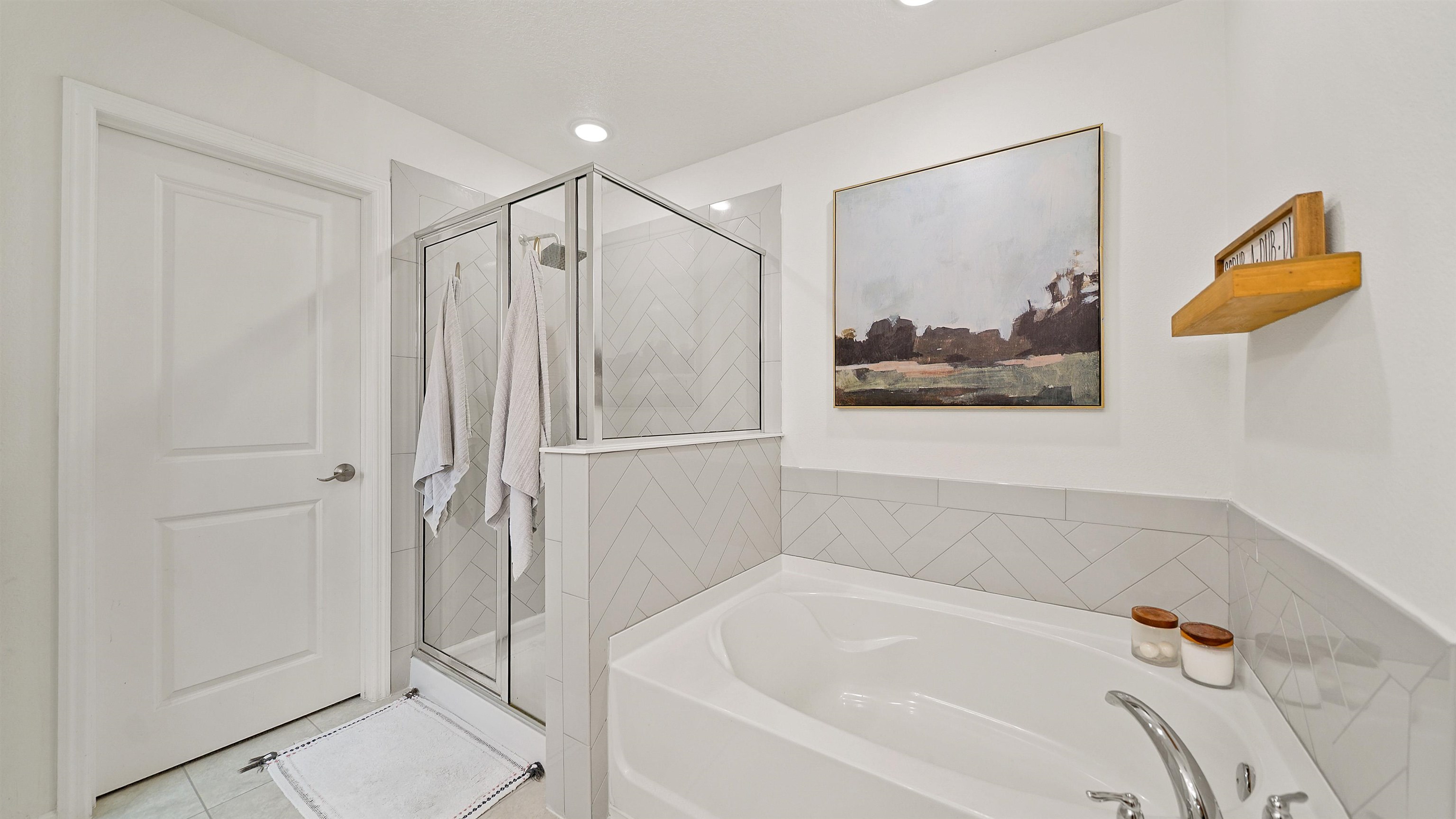 9658 Freefall Road Jacksonville, FL 32221 - Photo 27 of 39 a bathroom with a bathtub and a shower