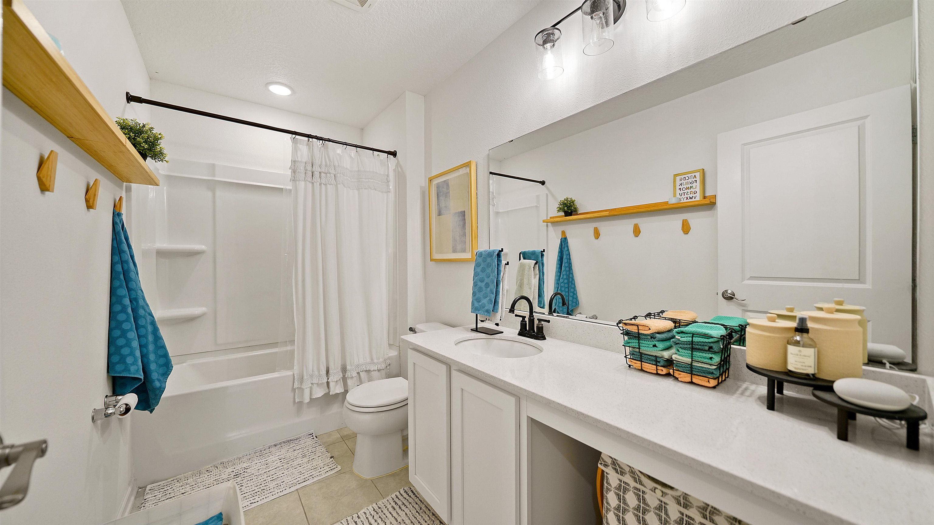 9658 Freefall Road Jacksonville, FL 32221 - Photo 30 of 39 a bathroom with a sink a toilet and shower
