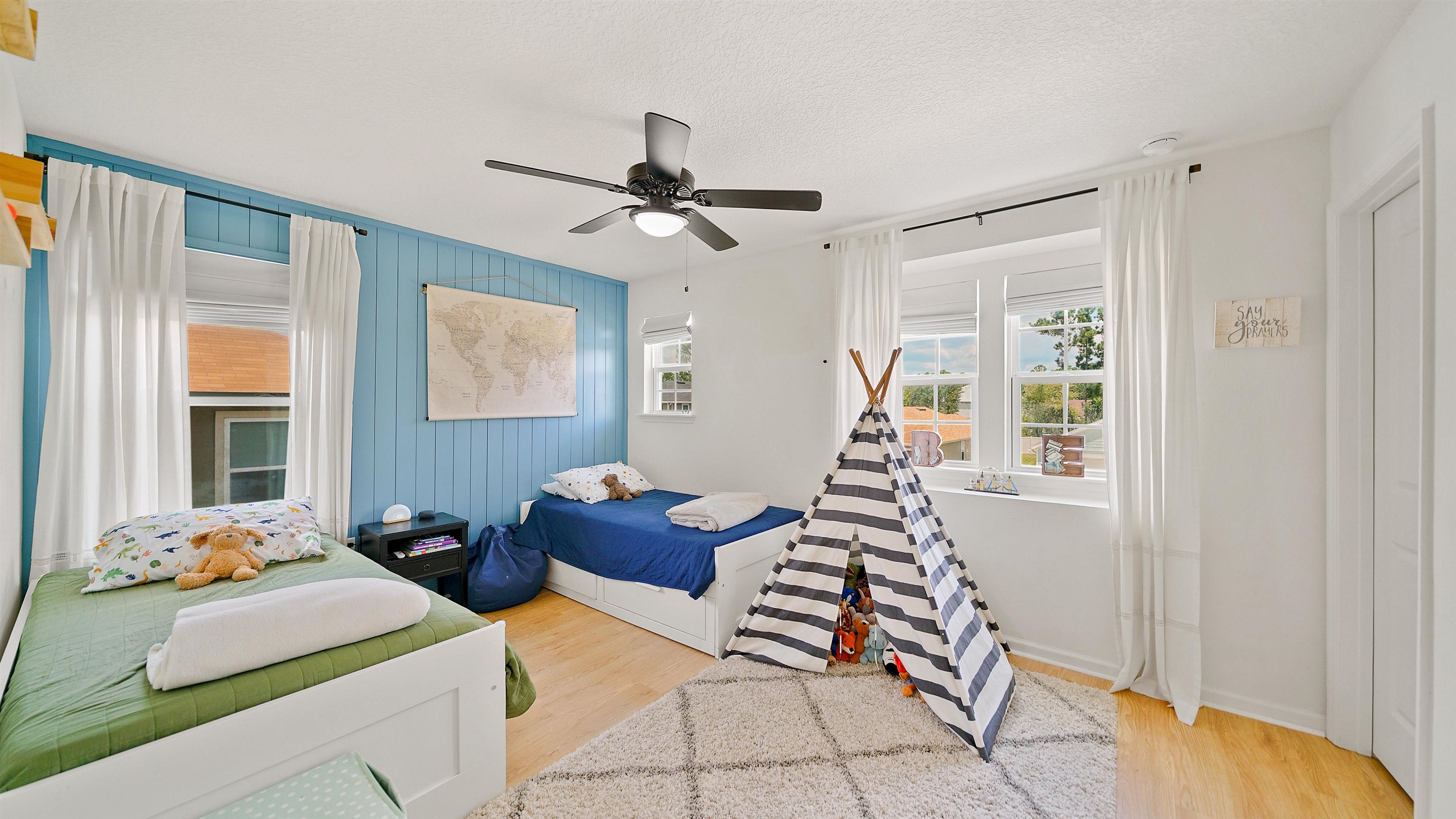 9658 Freefall Road Jacksonville, FL 32221 - Photo 31 of 39 a bedroom with double bed and a window