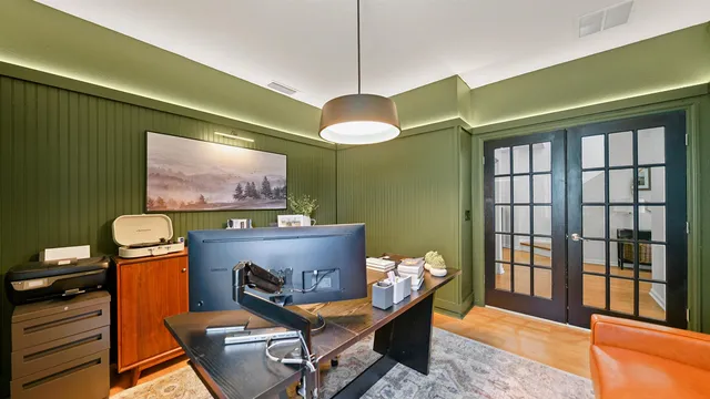 a living room with furniture and a window