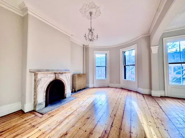 a living room with a fireplace