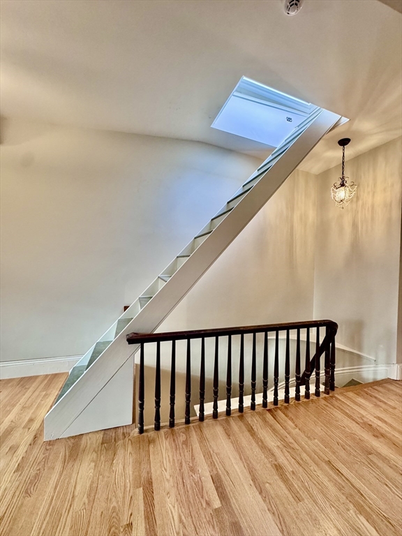 169 West Brookline Street, Unit PH Boston, MA 02118 - Photo 4 of 19 a balcony with wooden floor