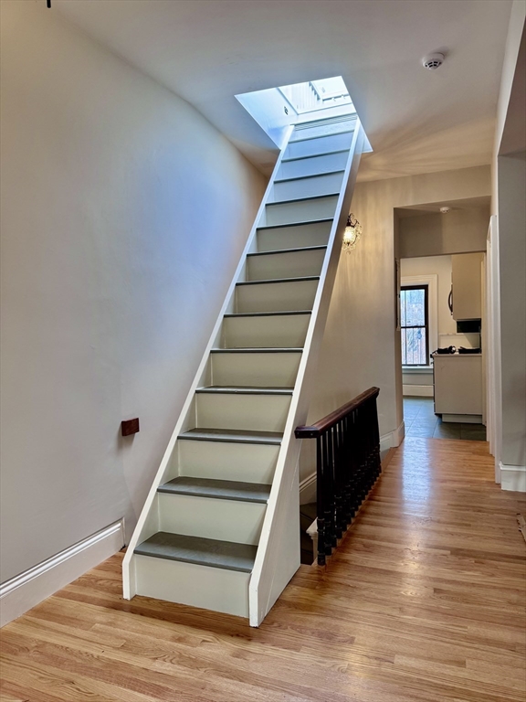 169 West Brookline Street, Unit PH Boston, MA 02118 - Photo 5 of 19 a view of entryway and hall with wooden floor