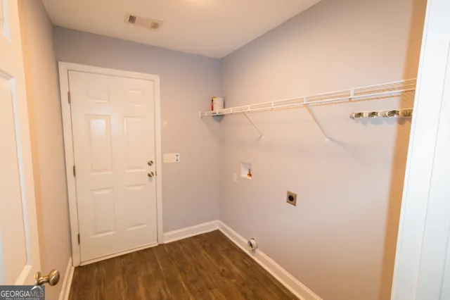 a view of a room with racks on the wall