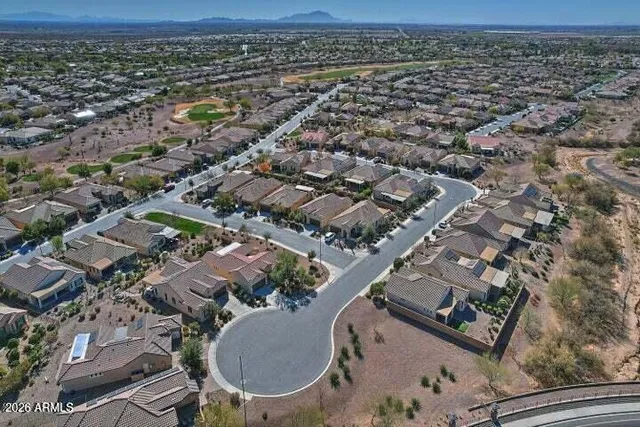 a view of a swimming pool with a garden