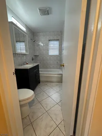 a bathroom with a sink and a shower