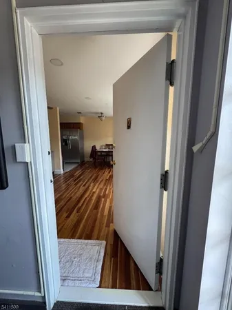 a view of a hallway view with staircase
