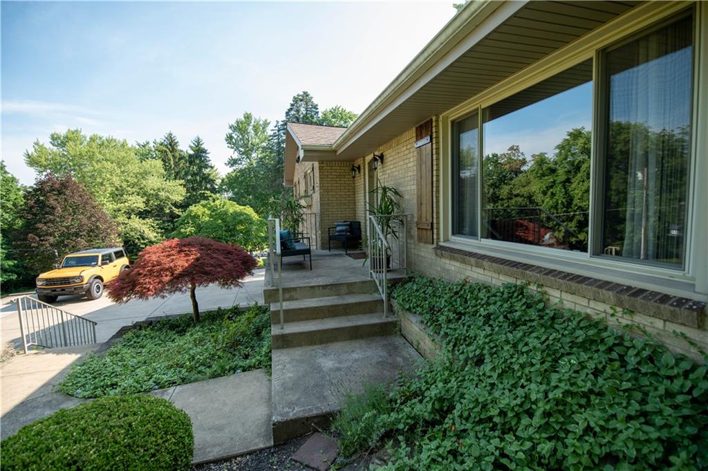 123 Dalecrest Road Verona, PA 15147 - Photo 23 of 25 a view of a garden with a patio