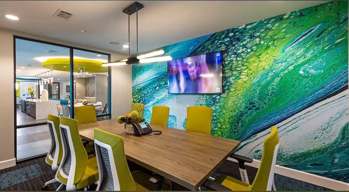 7204 Town Center Boulevard, Unit A1 Rosenberg, TX 77471 - Photo 10 of 12 a dining room with furniture and chandelier