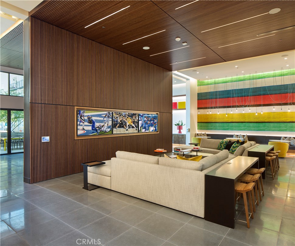 19525 Nordhoff Street, Unit 25662 Northridge, CA 91324 - Photo 18 of 26 a room with furniture and window