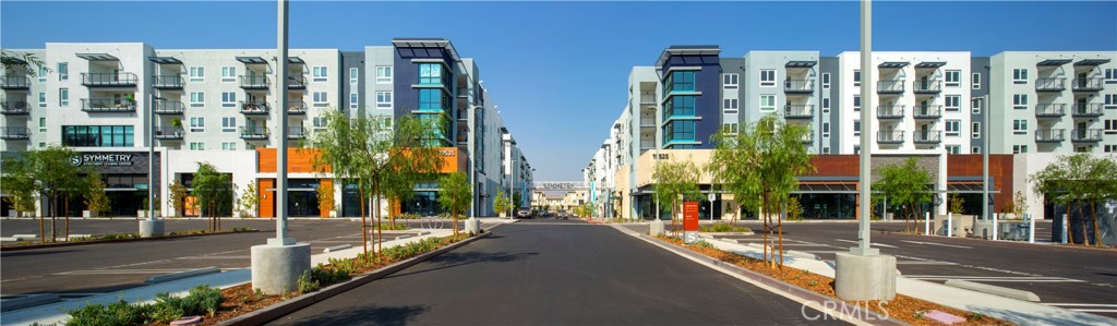19525 Nordhoff Street, Unit 25662 Northridge, CA 91324 - Photo 2 of 26 a view of a city with tall buildings