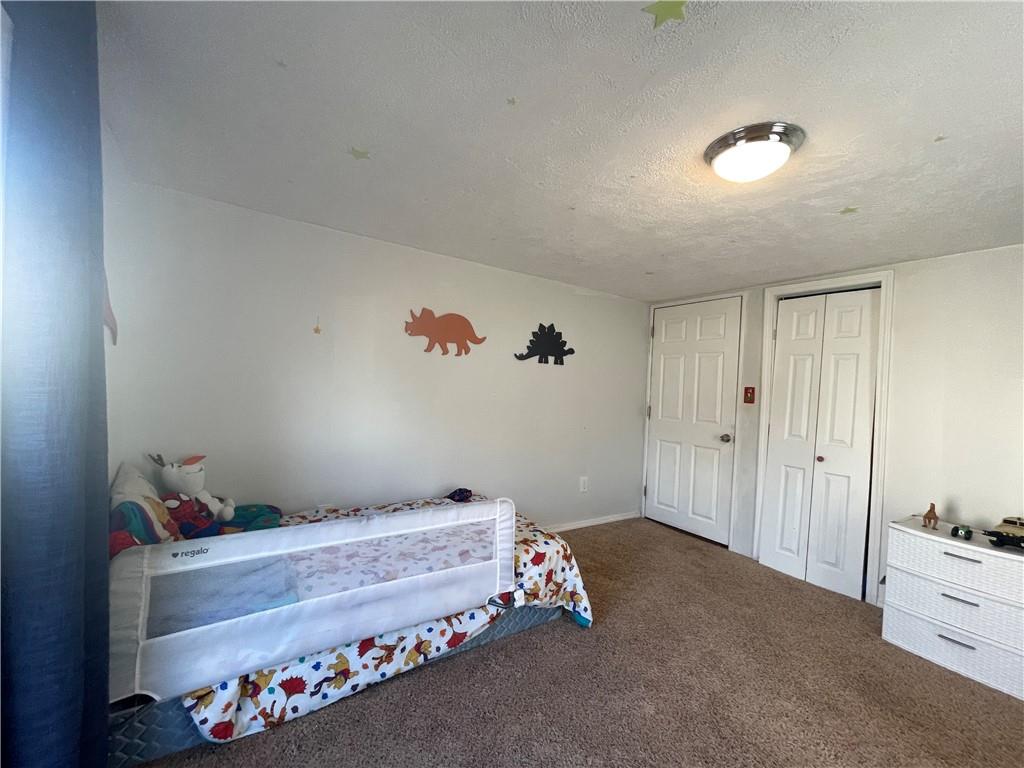 69 Hewitt Avenue Washington, PA 15301 - Photo 12 of 27 a bedroom with furniture and window