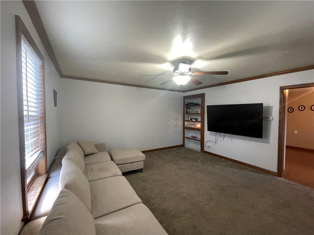 69 Hewitt Avenue Washington, PA 15301 - Photo 22 of 27 a living room with furniture and a flat screen tv