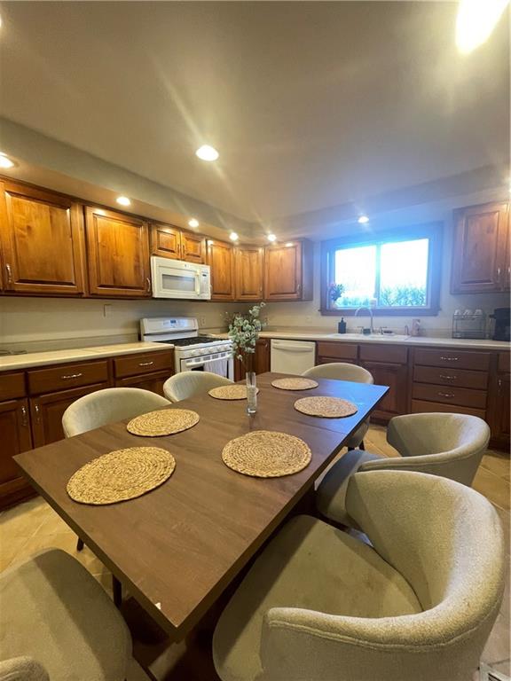 69 Hewitt Avenue Washington, PA 15301 - Photo 26 of 27 a kitchen with a table chairs stove and kitchen island