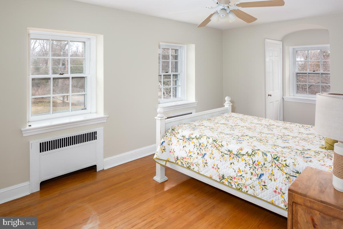 567 Manor Road Wynnewood, PA 19096 - Photo 24 of 34 a bedroom with bed and window