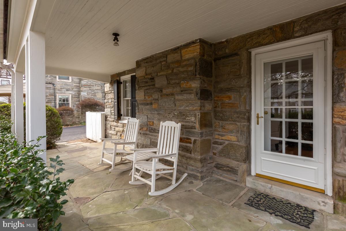 567 Manor Road Wynnewood, PA 19096 - Photo 34 of 34 a patio with table and chairs and potted plants