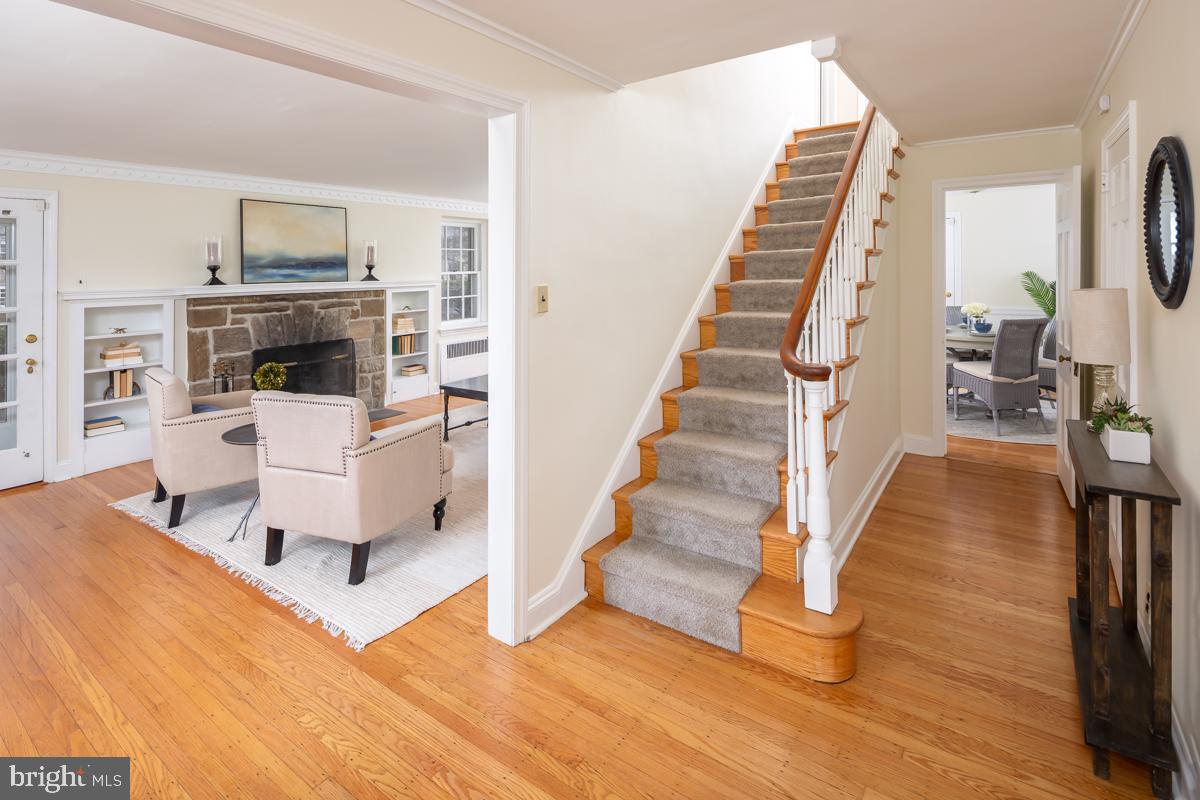 567 Manor Road Wynnewood, PA 19096 - Photo 4 of 34 a view of entryway and hall with wooden floor