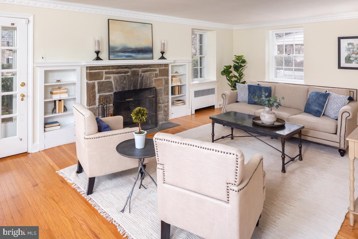 567 Manor Road Wynnewood, PA 19096 - Photo 5 of 34 a living room with furniture and a fireplace